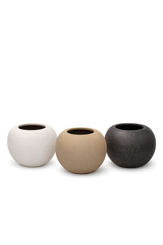 Set of three modern, round decorative planter.