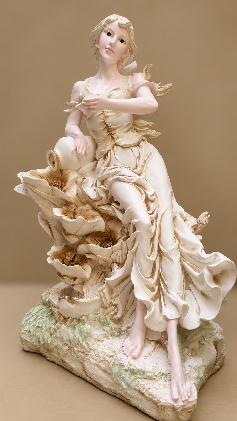 Elegant Lady with Floral Cascade Water Fountain