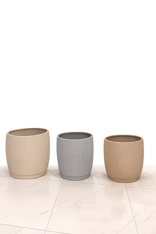 Set of three textured decorative pots