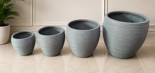 Set of four round ribbed planters